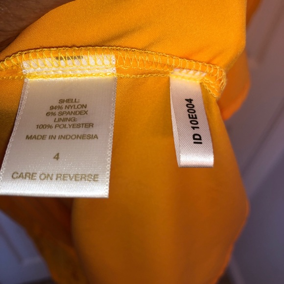 Eva Mendes for New York and Company yellow dress. - Picture 12 of 15